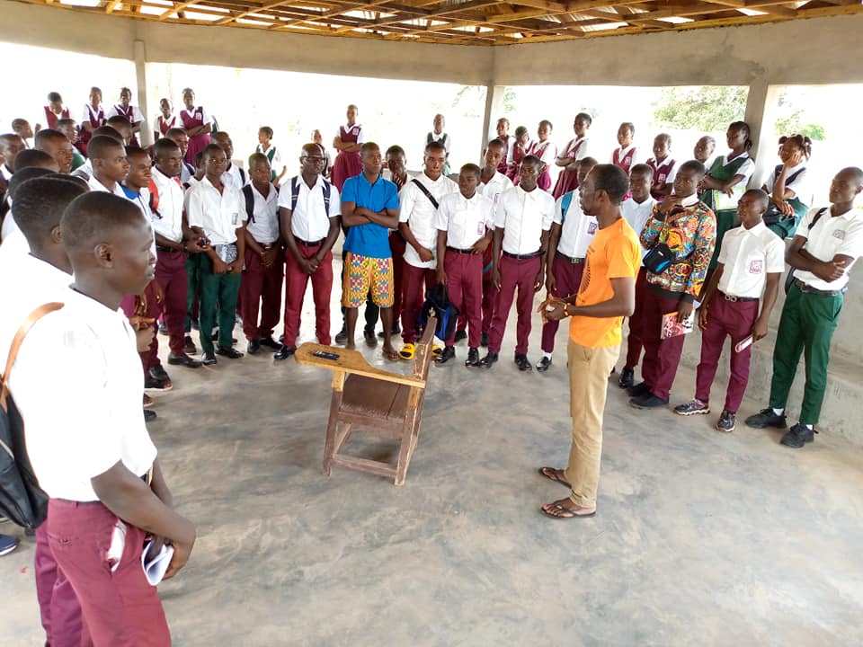 Mentorship club with boys in school uniforms